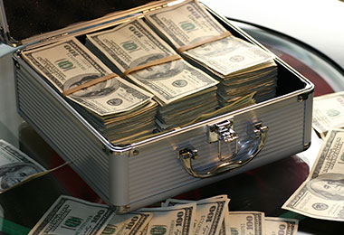 metal briefcase full of hundred dollar bills